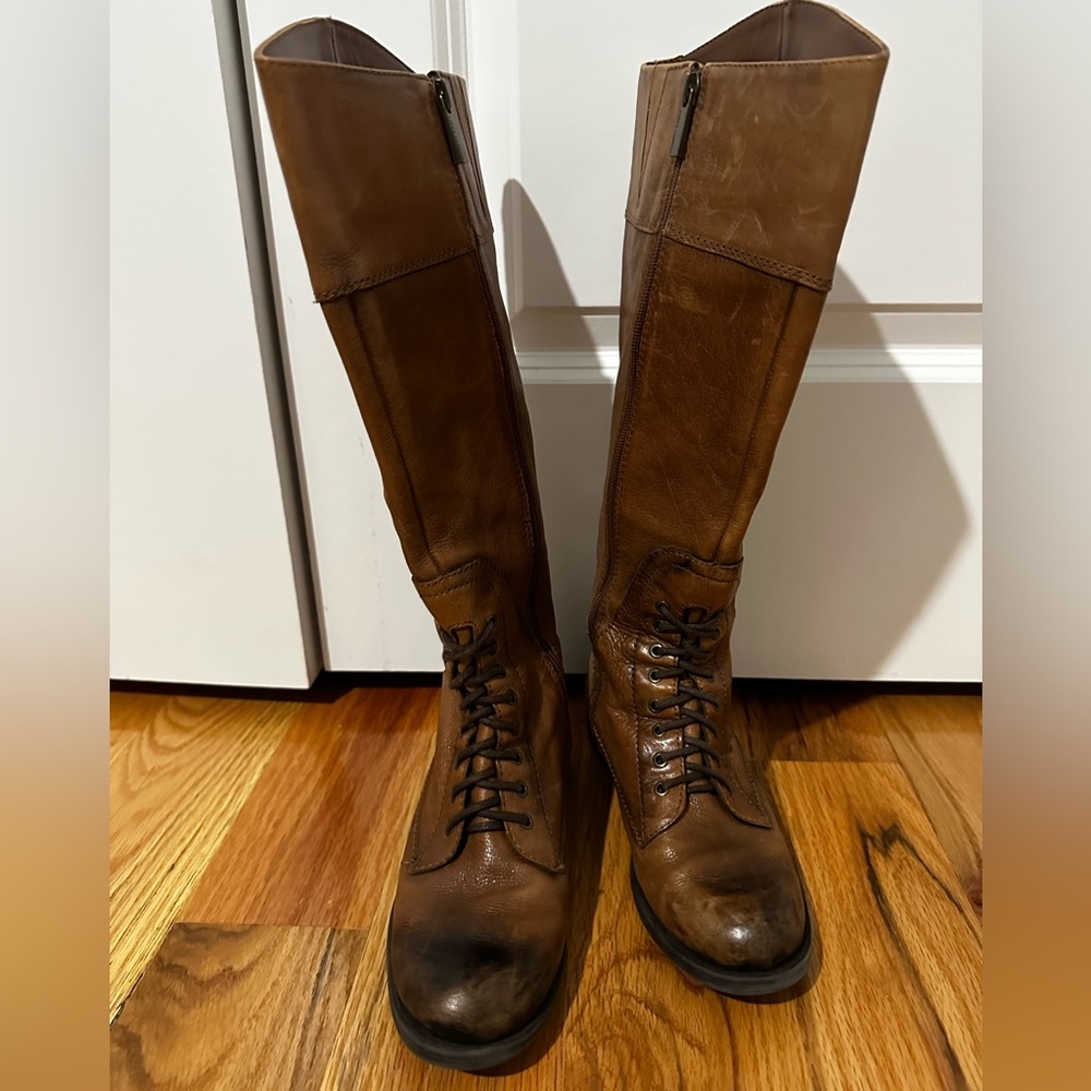 Vince Camuto knee high boots.